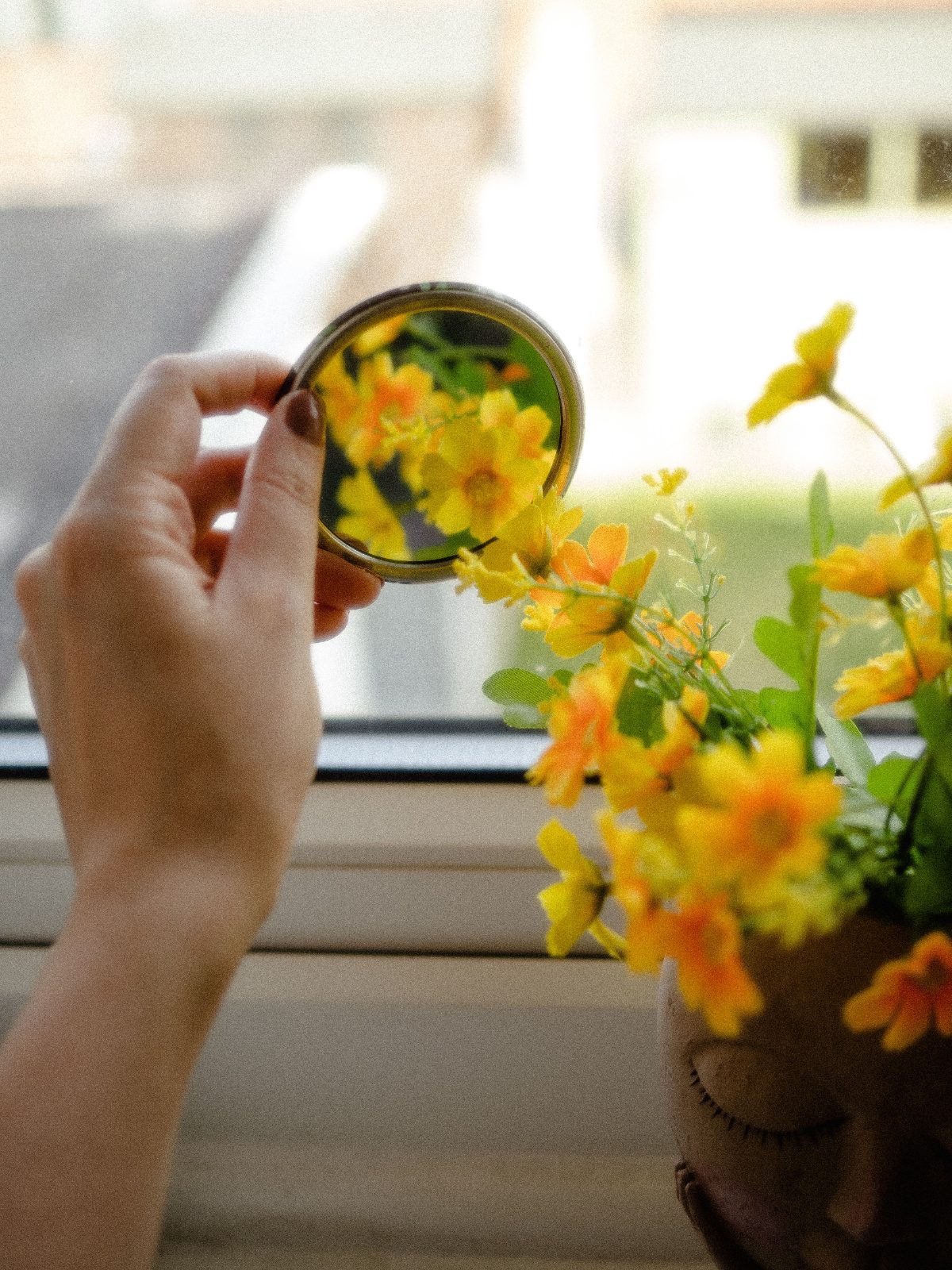 Flowers reflected in a mirror